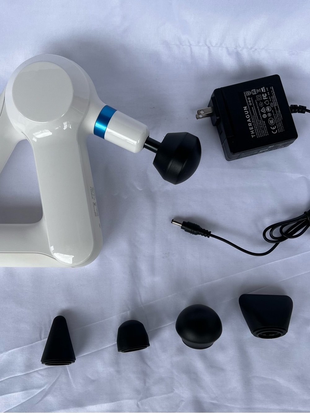 Therabody Theragun White & Blue Percussion Massage Gun with Black Attachment Set